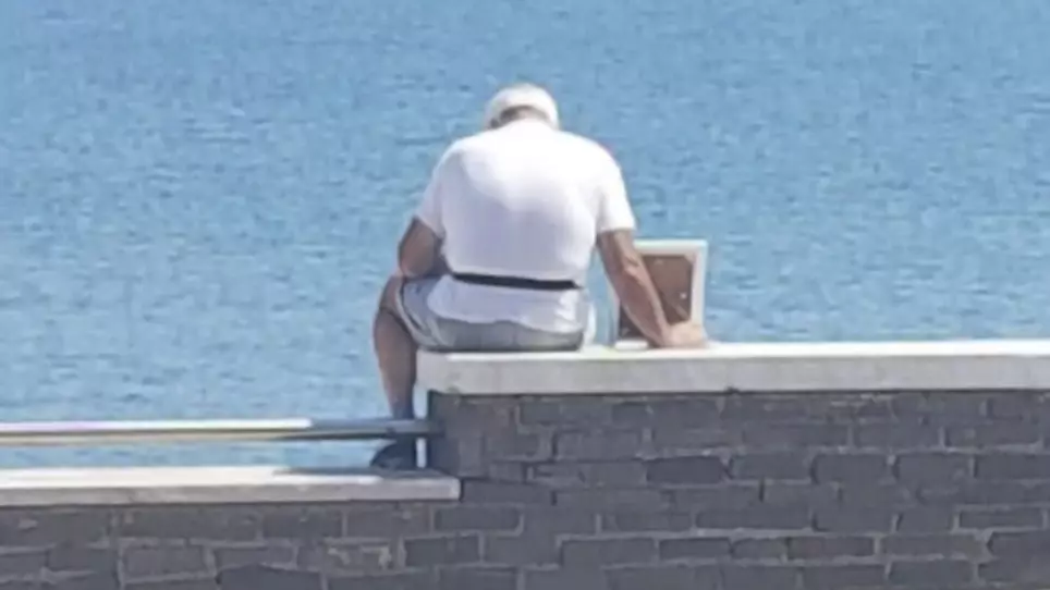 ​OAP Takes Framed Photo Of Late Wife To See The Sea View Every Day