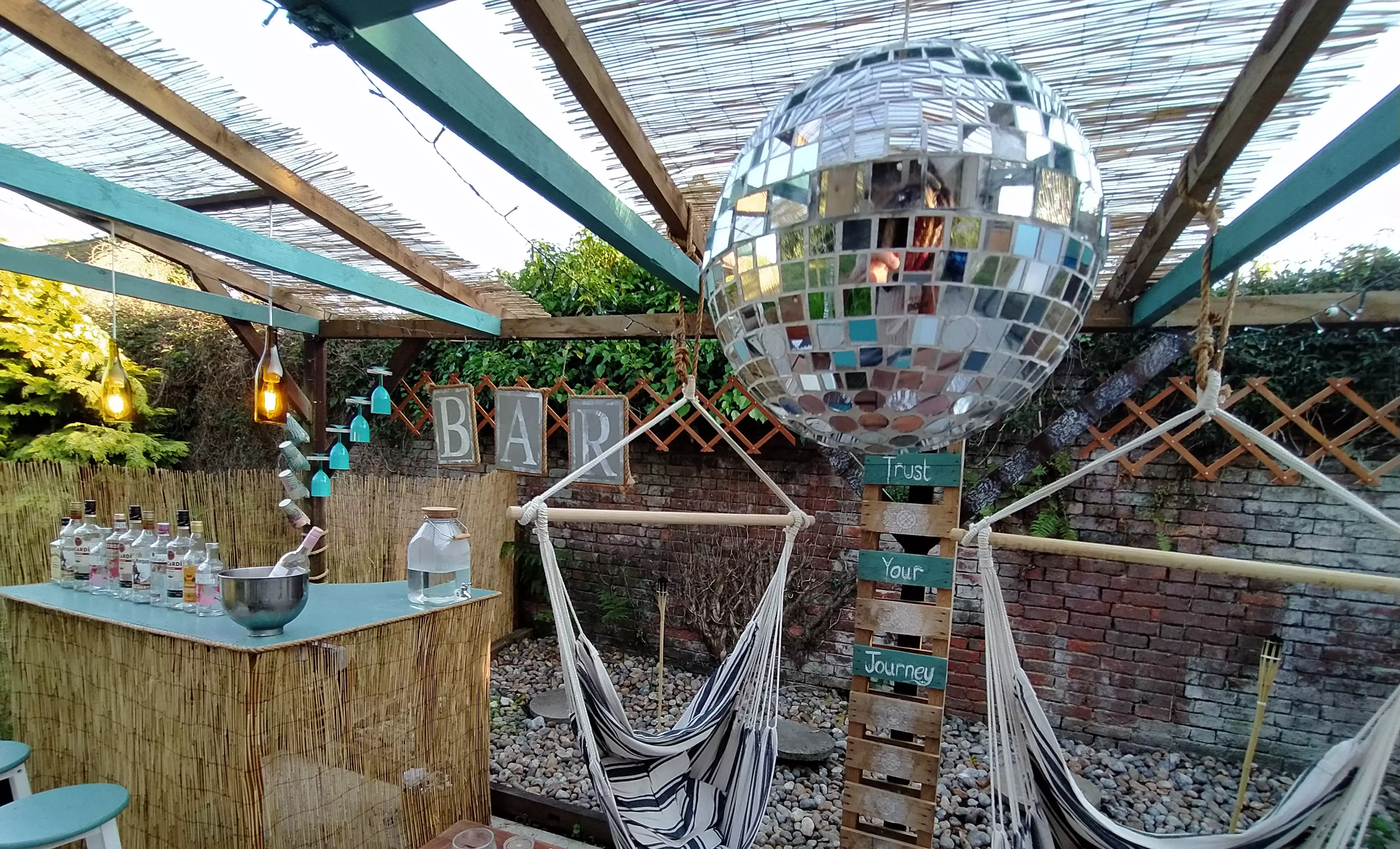 A re-glued disco ball adds a finishing touch (