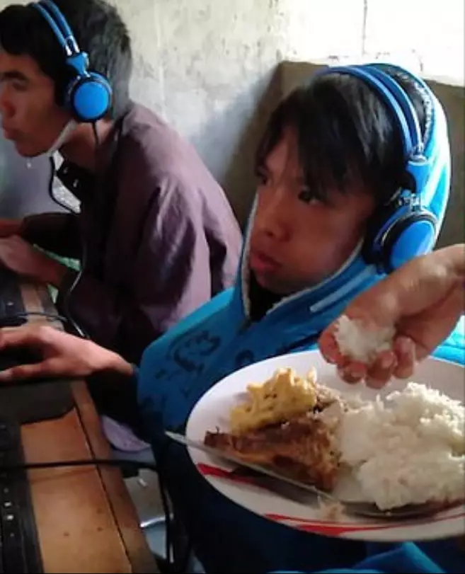 The concerned mum has to feed her son while he plays video games as he won't leave the screen.