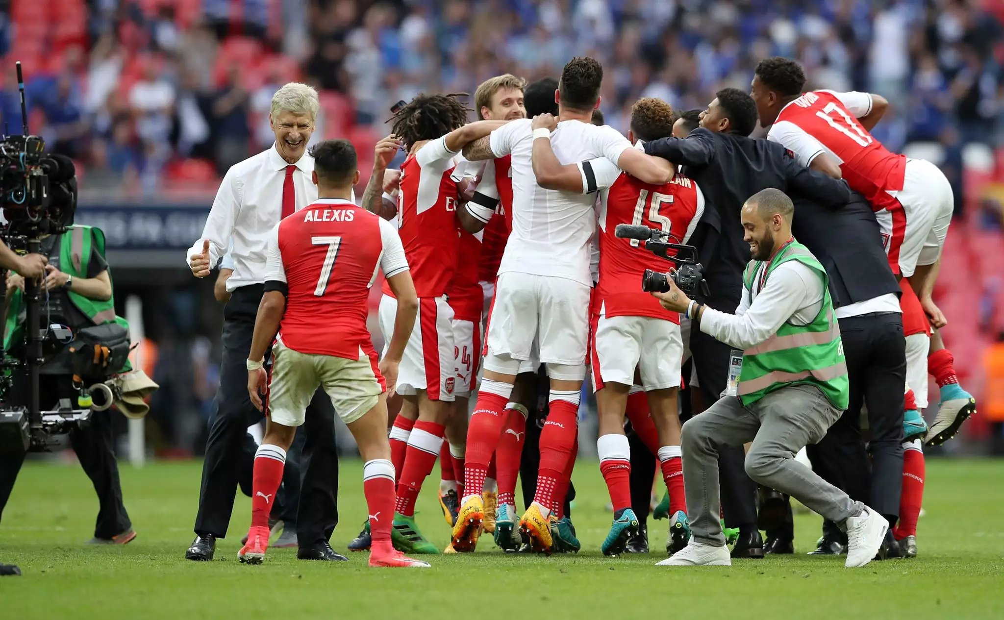 Arsenal players celebrate winning the FA Cup. Image: PA