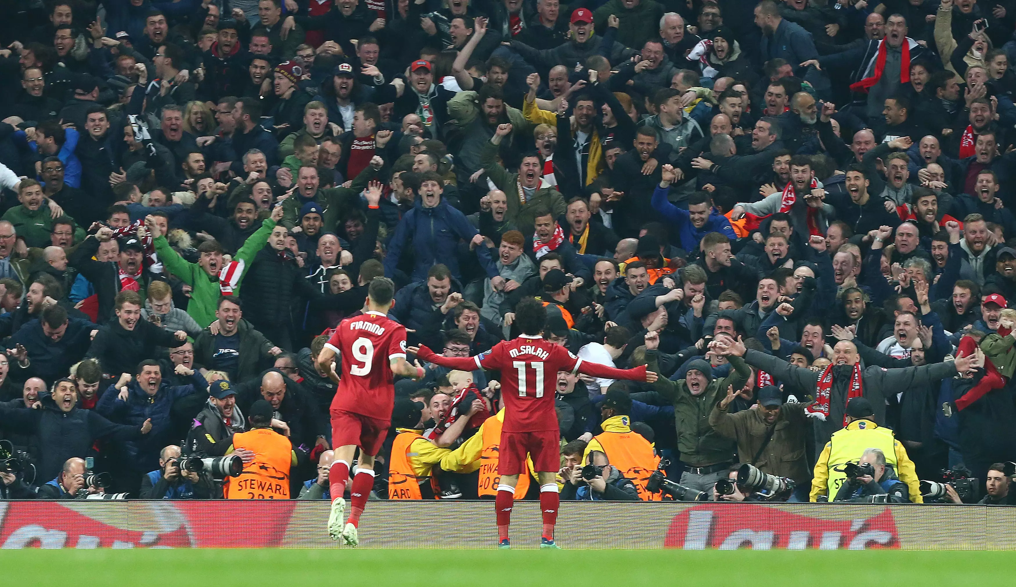 Salah celebrates scoring in front of the traveling Liverpool support. Image: PA