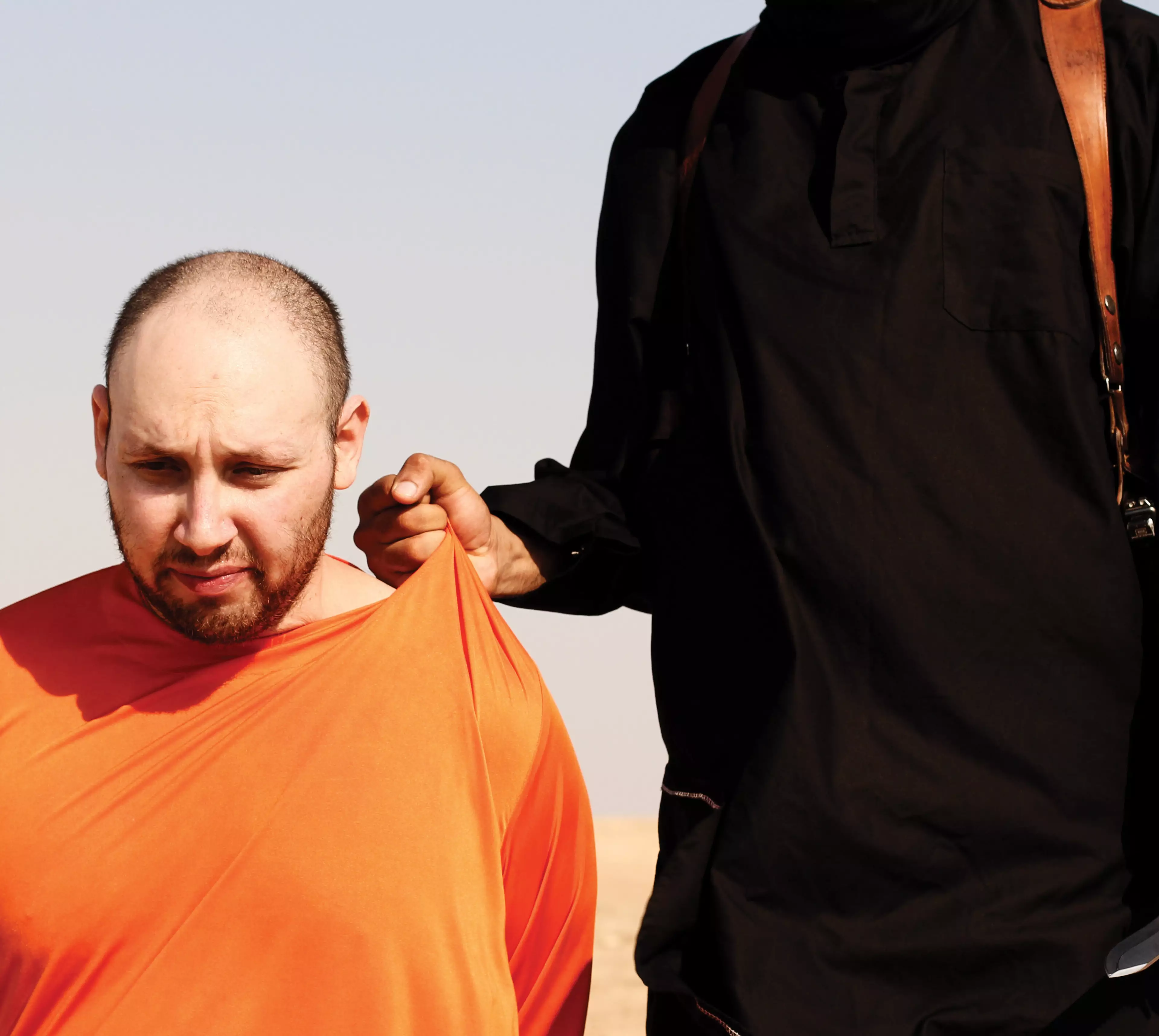 Islamic State of Iraq and the Levant propaganda photo showing the execution of American journalist Steven Sotloff by masked ISIS militant Jihadi John in September 2014 (