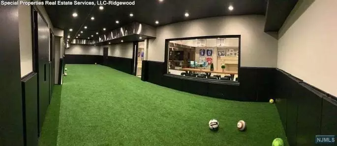 Indoor pitch for shooting practice. Image: Realtor