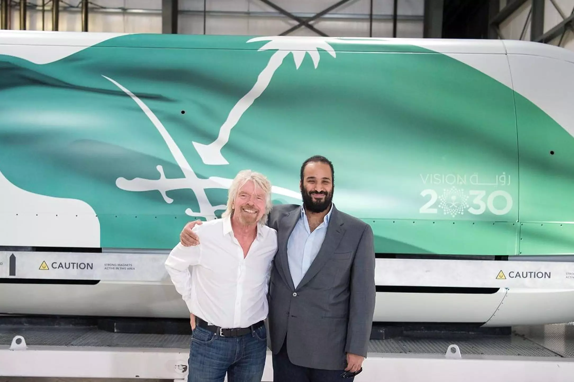 Crown Prince Mohammed bin Salman with Richard Branson promoting Vision 2030.