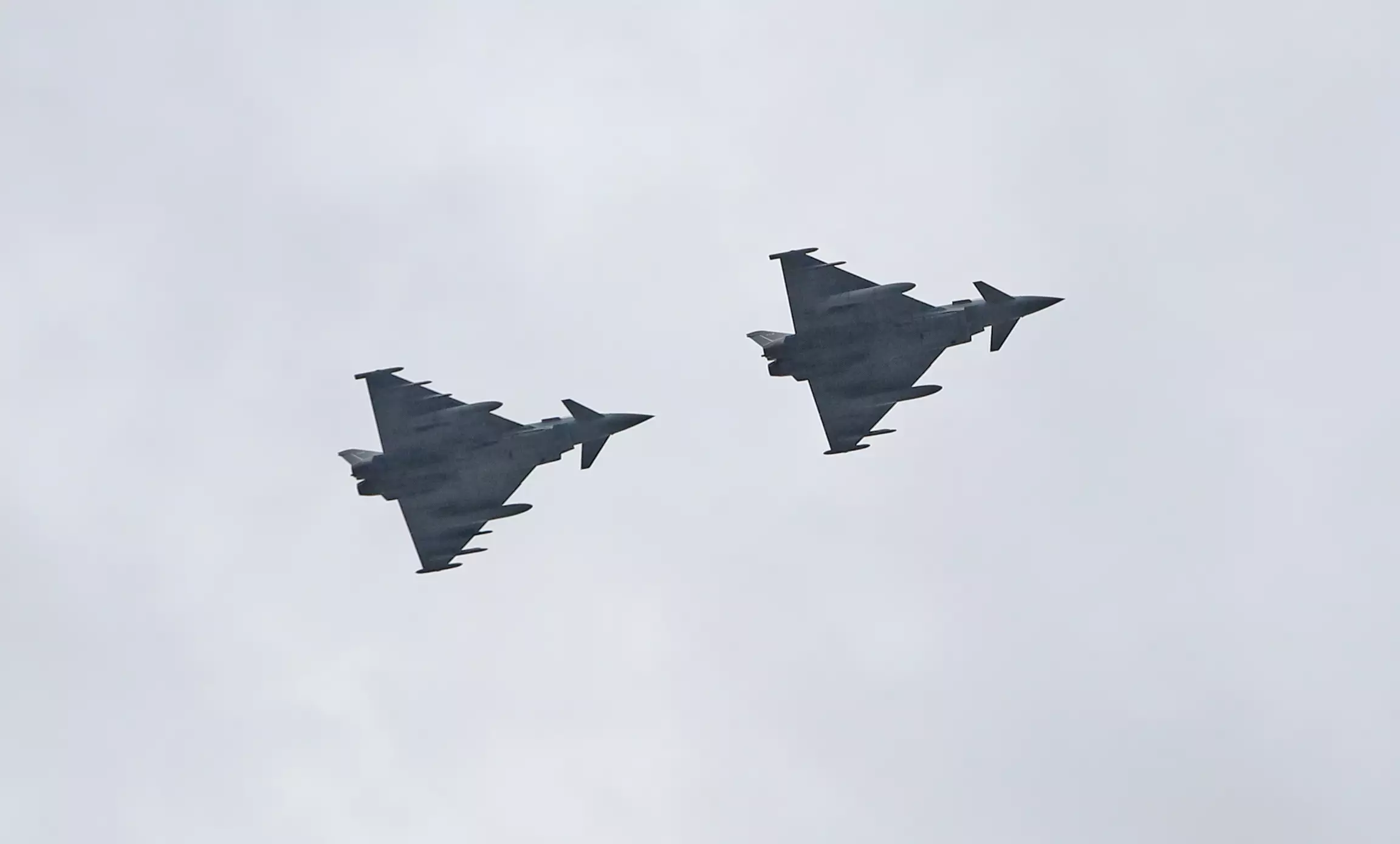 Stock image of two RAF Typhoon fighter jets.