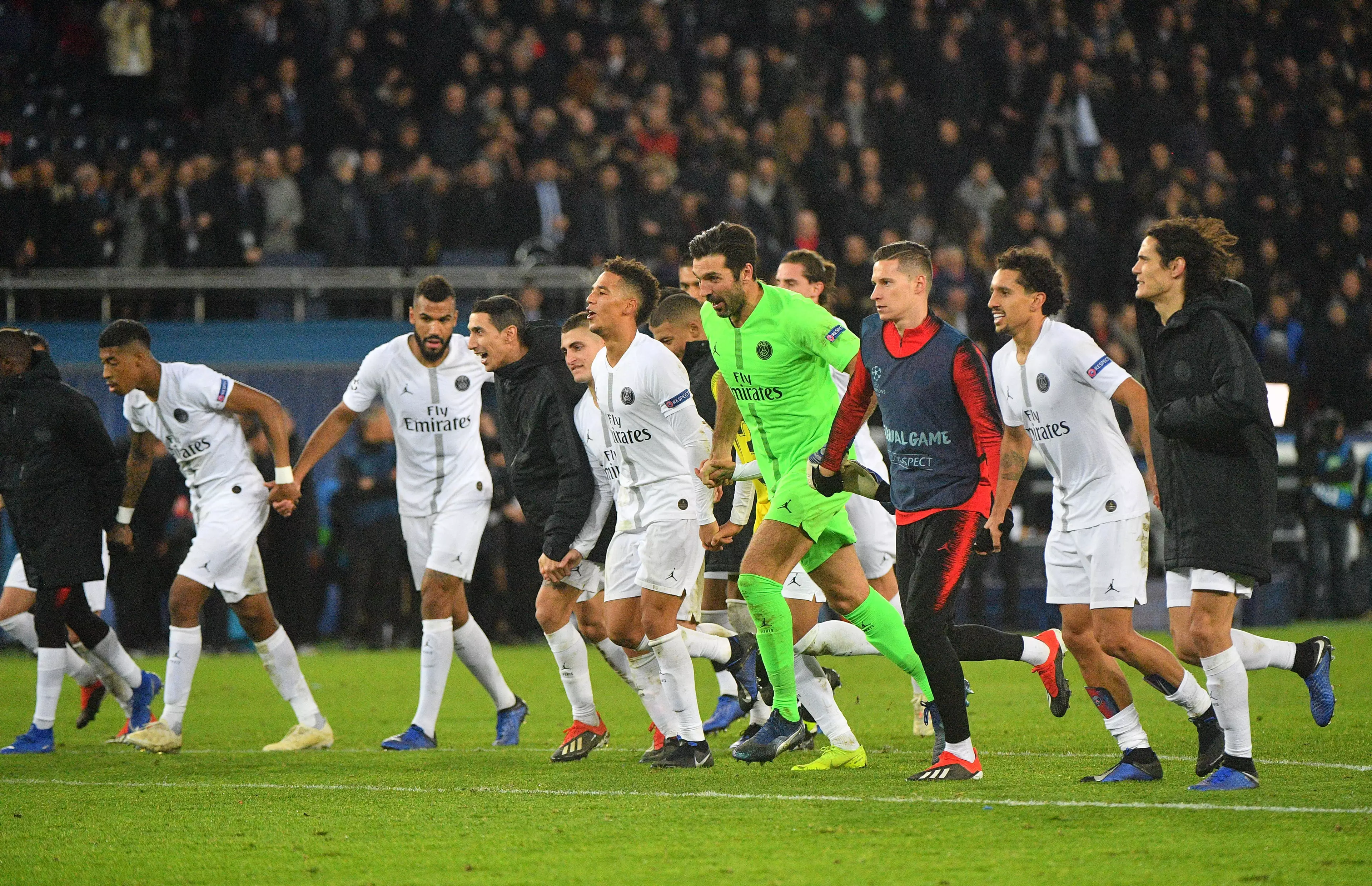 PSG players celebrate the win over Liverpool. Image: PA Images