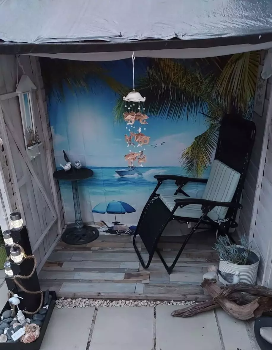 Kim turned her old garden shed into a beach (