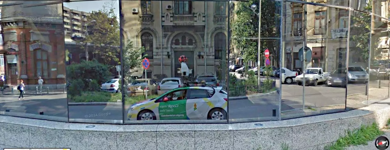A mirror image of the Google Maps Street View Car.