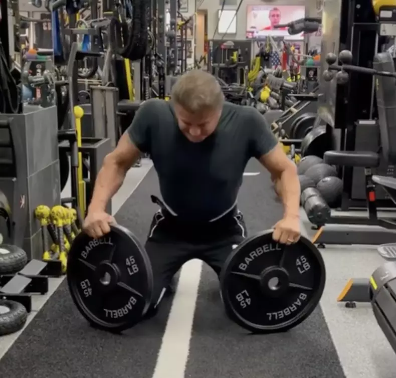 The actor started on his knees with approx 20kg weights in each hand.