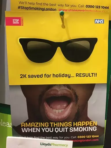 One of the posters shows a male model bragging about saving up money for a holiday.
