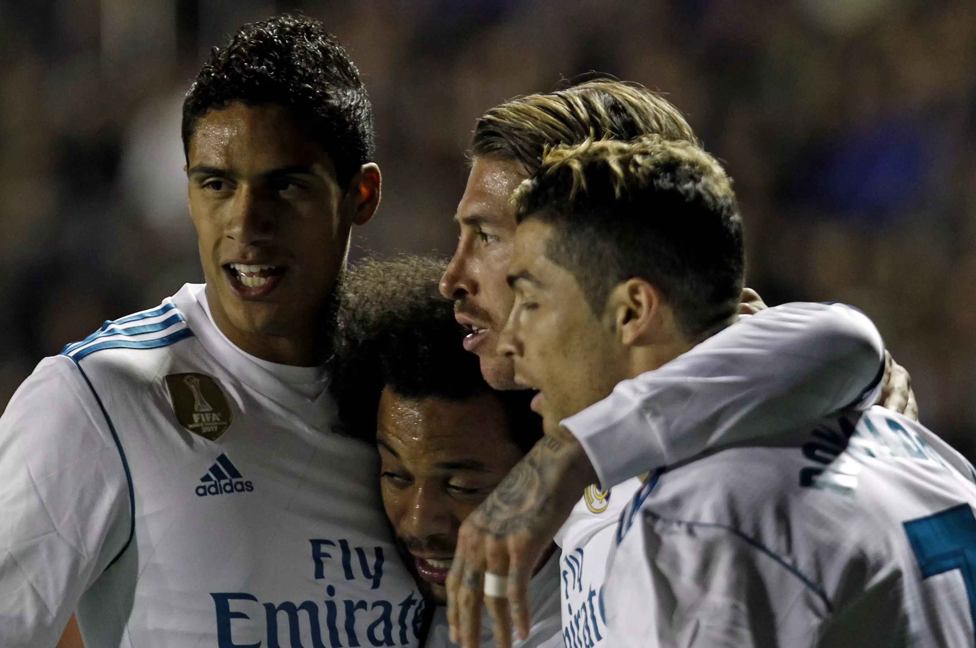 Ramos celebrates with his teammates. Image: PA