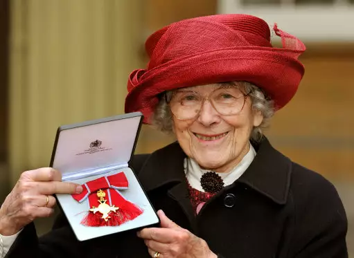 Judith Kerr proudly holds her Order of the British Empire (OBE) medal in 2013.