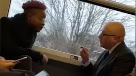 Woman Uses Racial Slurs Against Man In Row On Packed Train