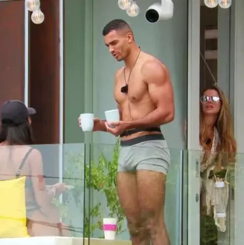 The hunky model spent the morning parading the villa in the grey shorts, which left little to the imagination (