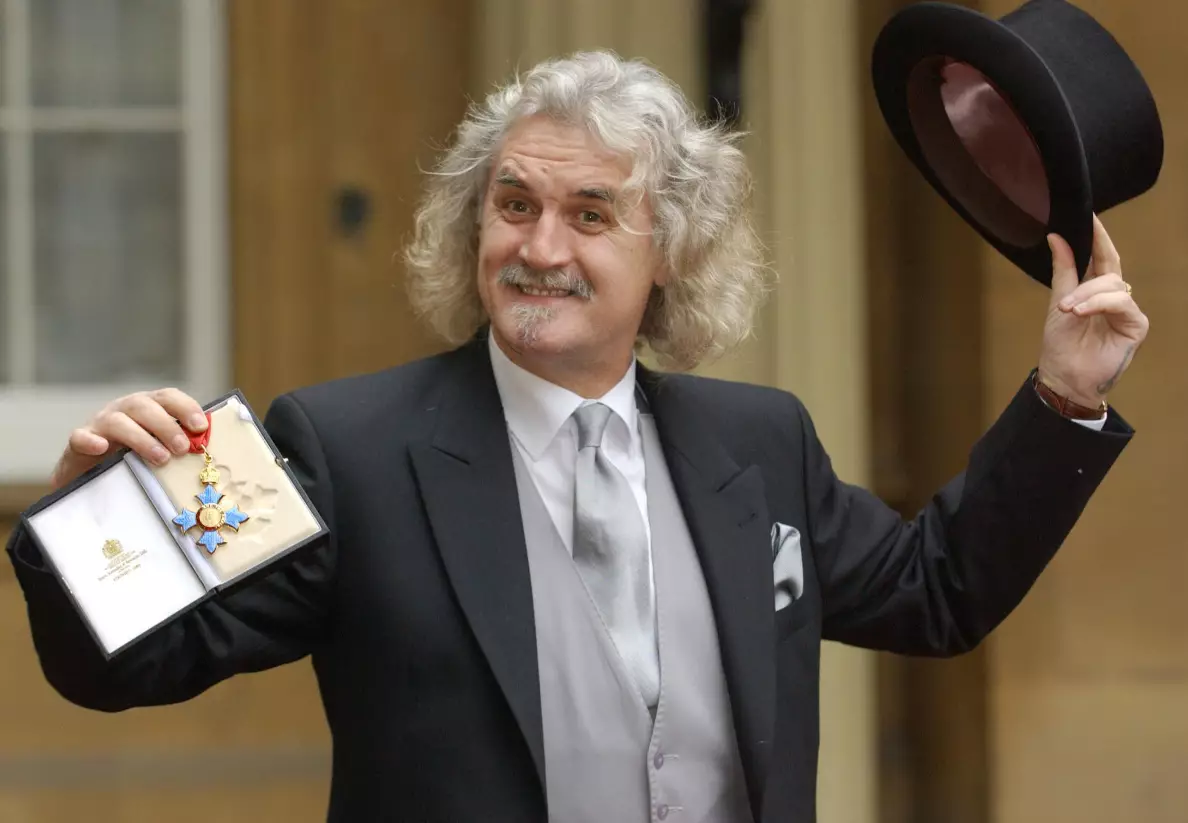 Billy Connolly with his CBE in 2003.