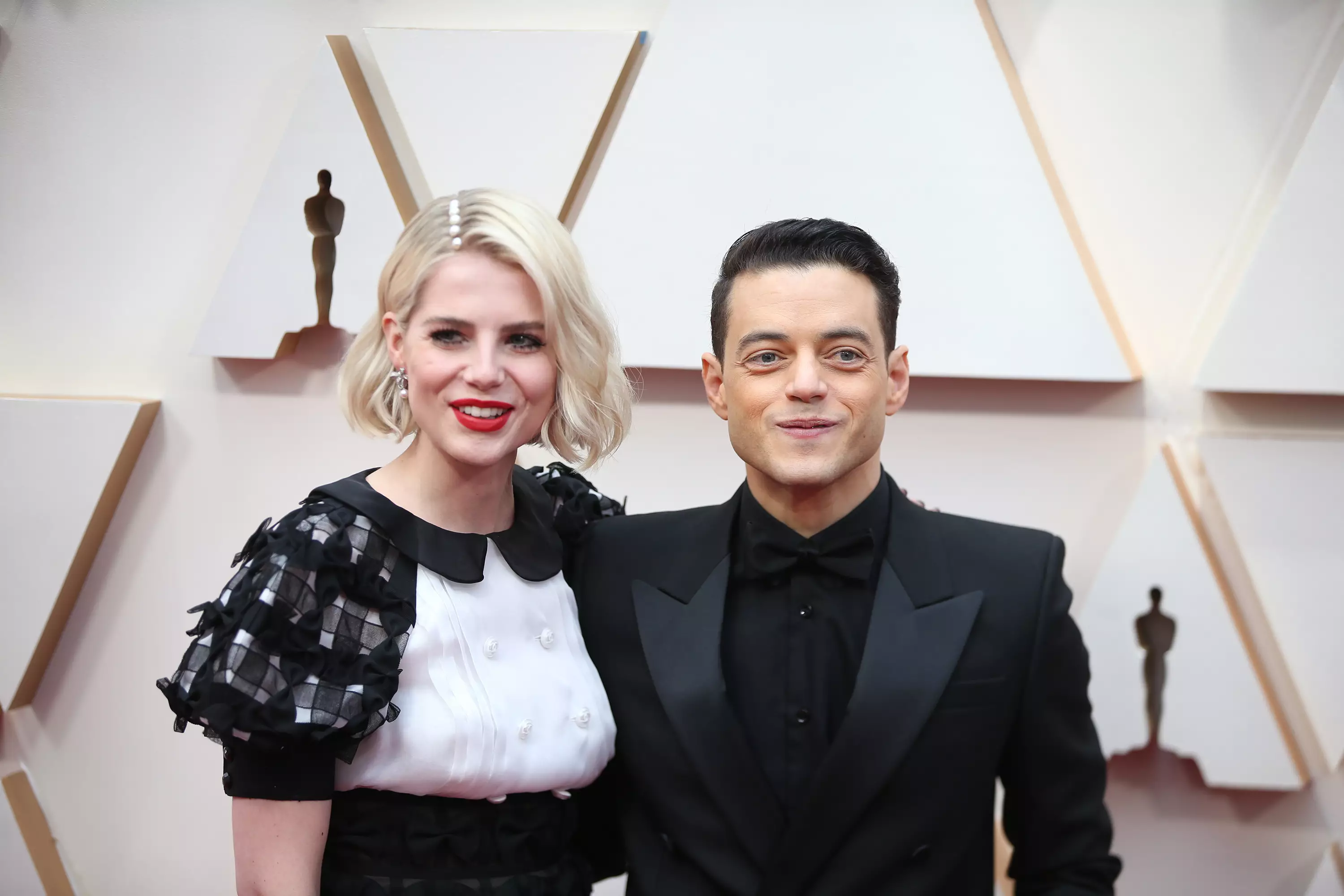 Rami Malek and Lucy Boynton arrive for the red carpet of the 92nd Academy Awards in 2020. (