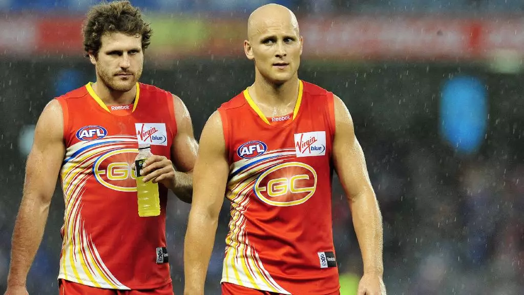 Brown (left) playing for the Gold Coast Suns.