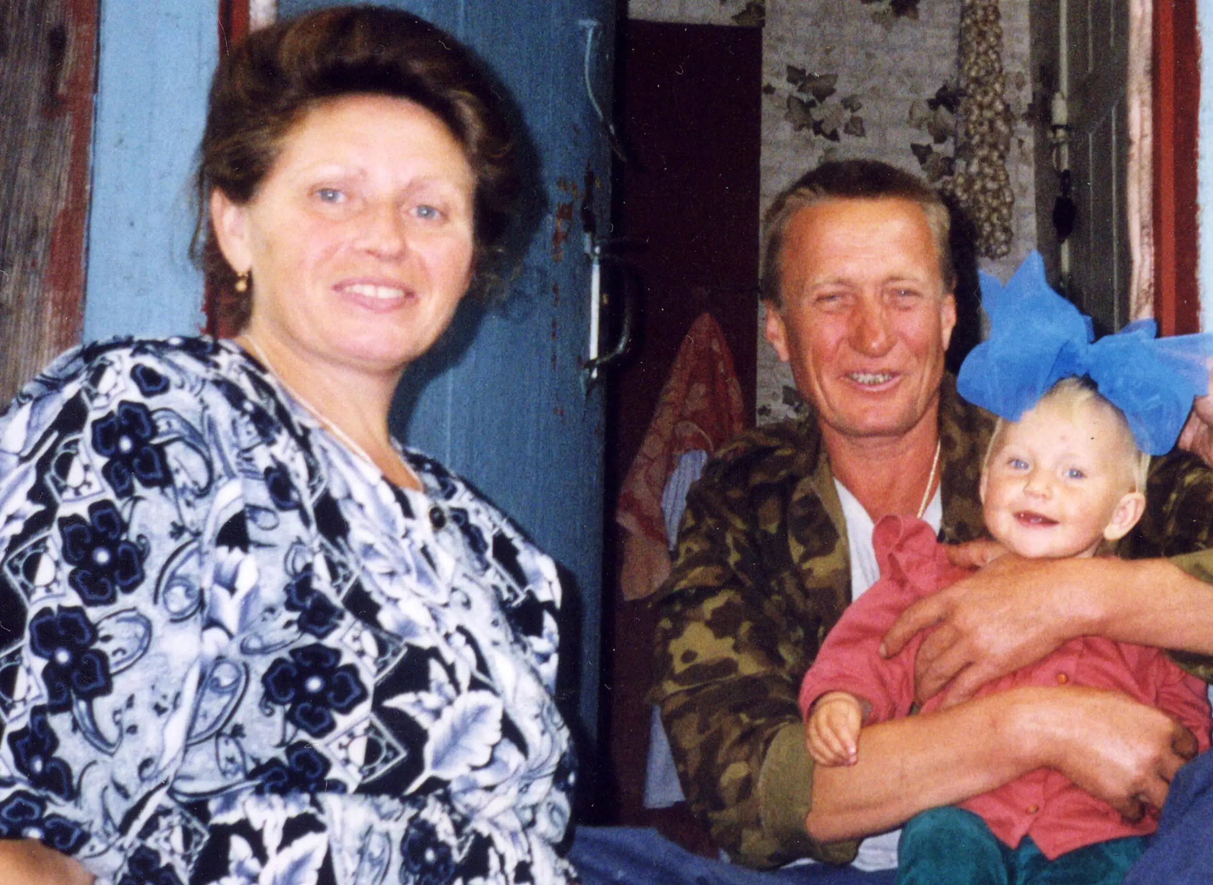 Mariyka with her parents Lydia and Mikhail, who was a firefighter called to work on the night of the disaster.