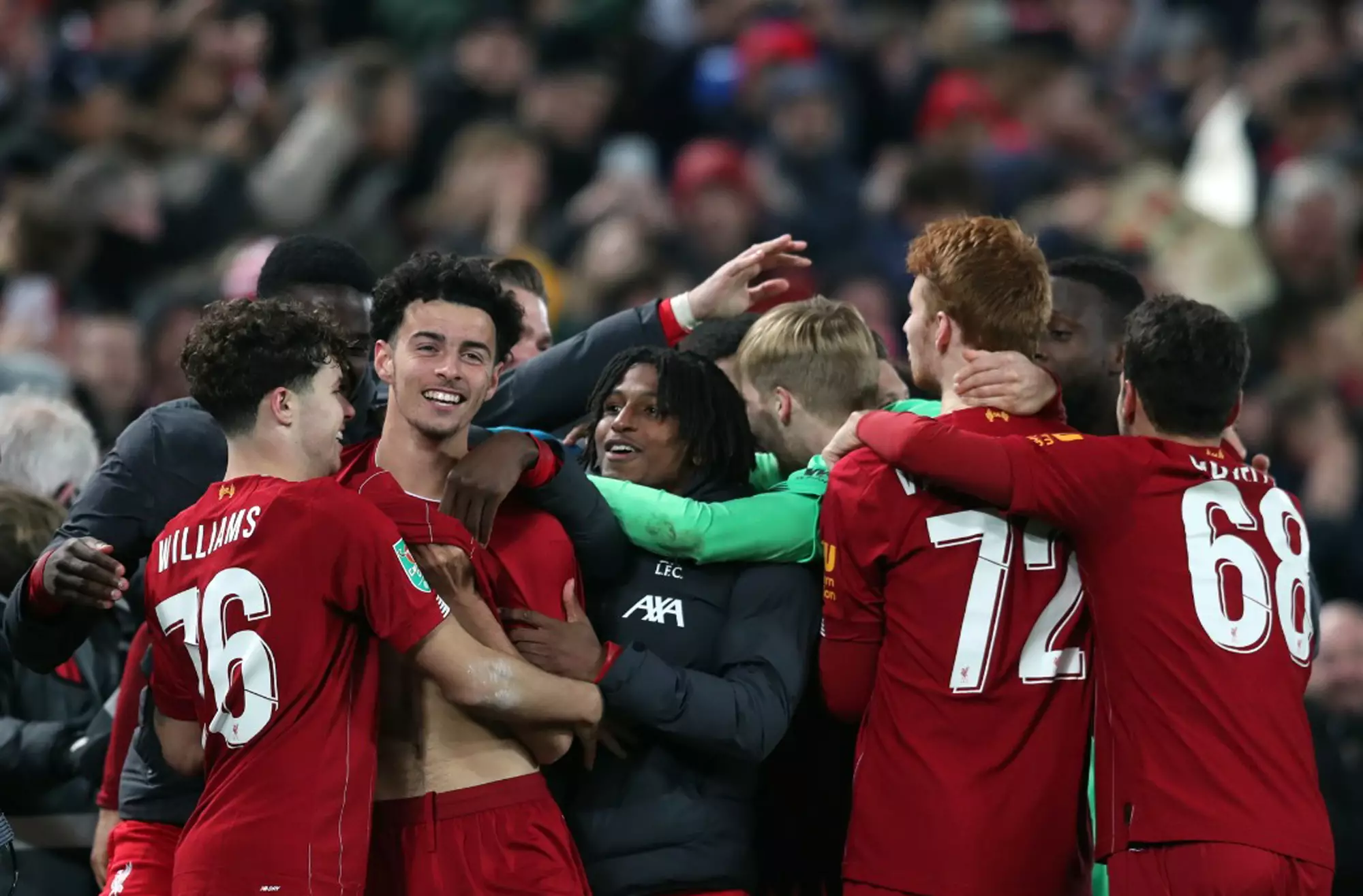 Liverpool celebrate after beating Arsenal 5-4 on penalties on Wednesday night. (Image