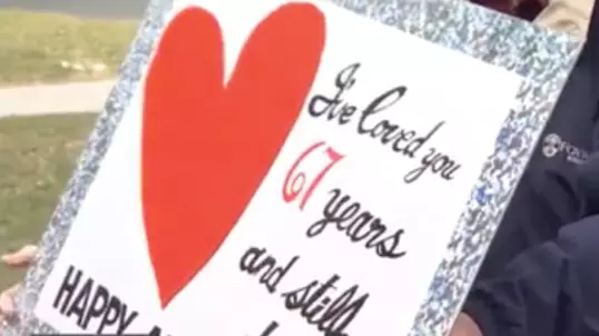 Elderly Man Wishes Wife Happy Anniversary Outside Care Home Amid COVID-19 Separation