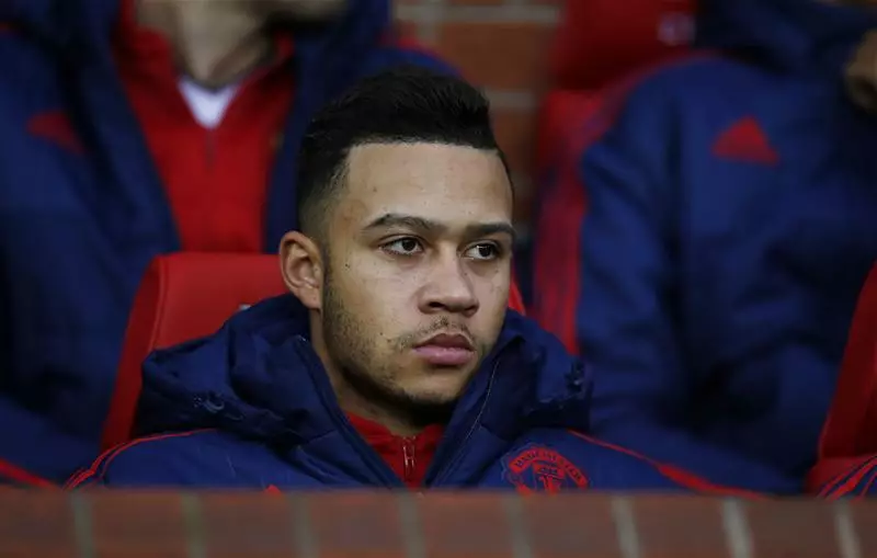 Memphis Depay on the bench