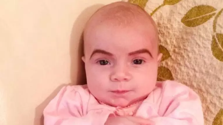 Mum Draws Eyebrows On Newborn Baby To 'Teach Her Not To Fall Asleep At Parties'