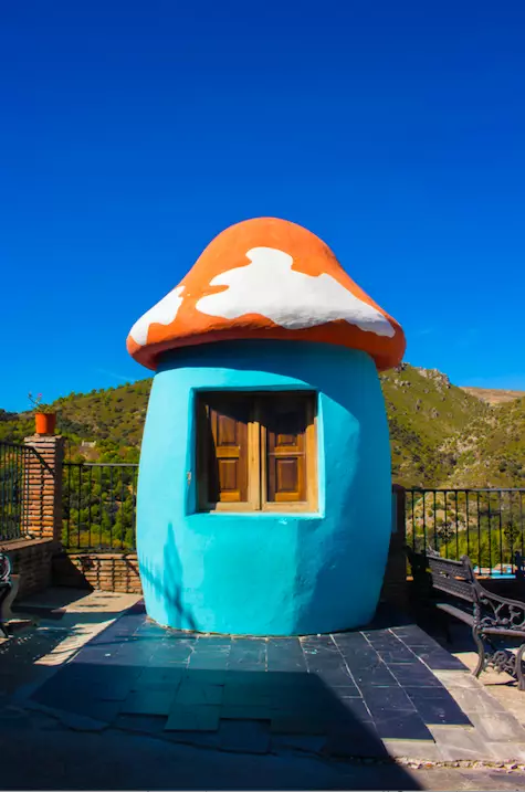 There's even mushroom huts owing to the blue character's homes (