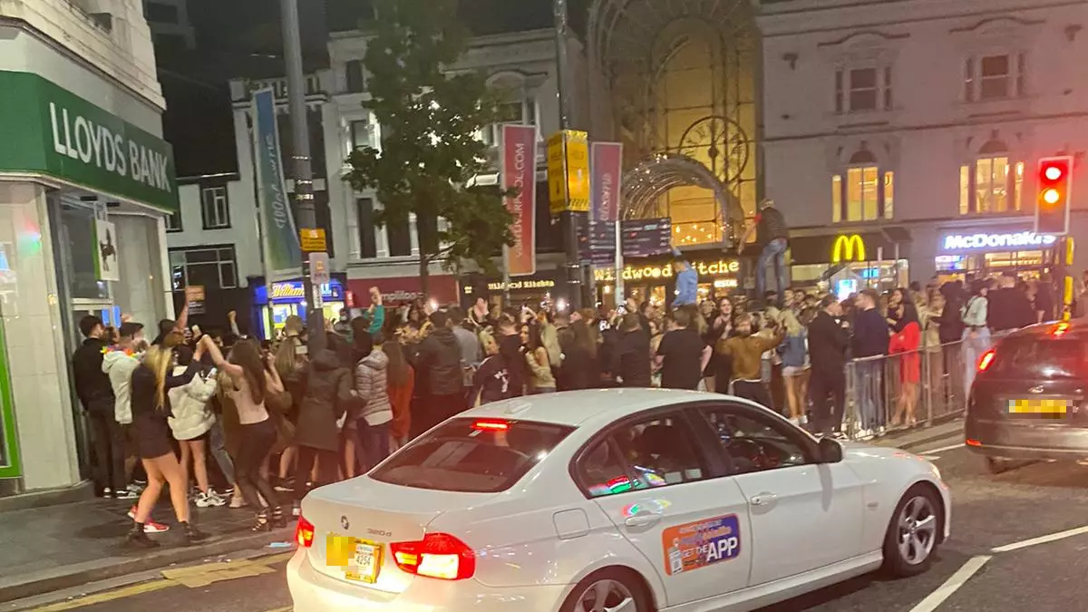 Video Shows Huge Crowd Gathering On Street After 10pm Curfew Comes Into Place