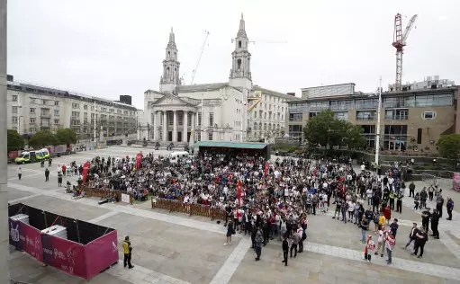 England fans watch the World Cup match between Tunisia and England on a big screen in Millennium Square, Leeds.