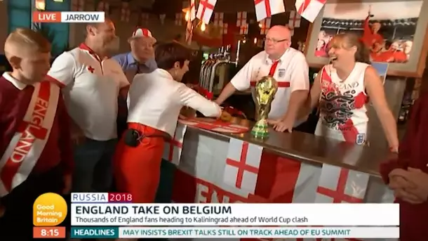 'GMB' Presenter Causes Controversy By Using German Flag As Beer Rag