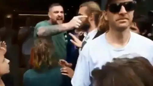 Man Shoves Climate Protesters To Get A Burger
