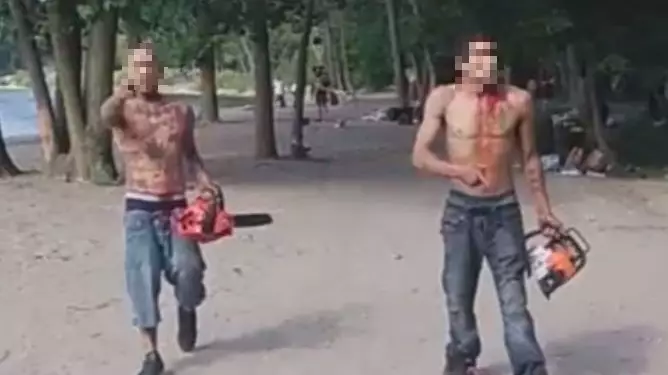 Blood-Covered Men Armed With Chainsaws Tell Beachgoers 'You're F****d'