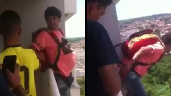 Man Parachutes From High-Rise Building In Bizarre Stunt