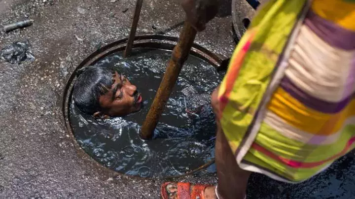 Hate Your Job? This Man Has To Jump Down A Filthy Sewer 