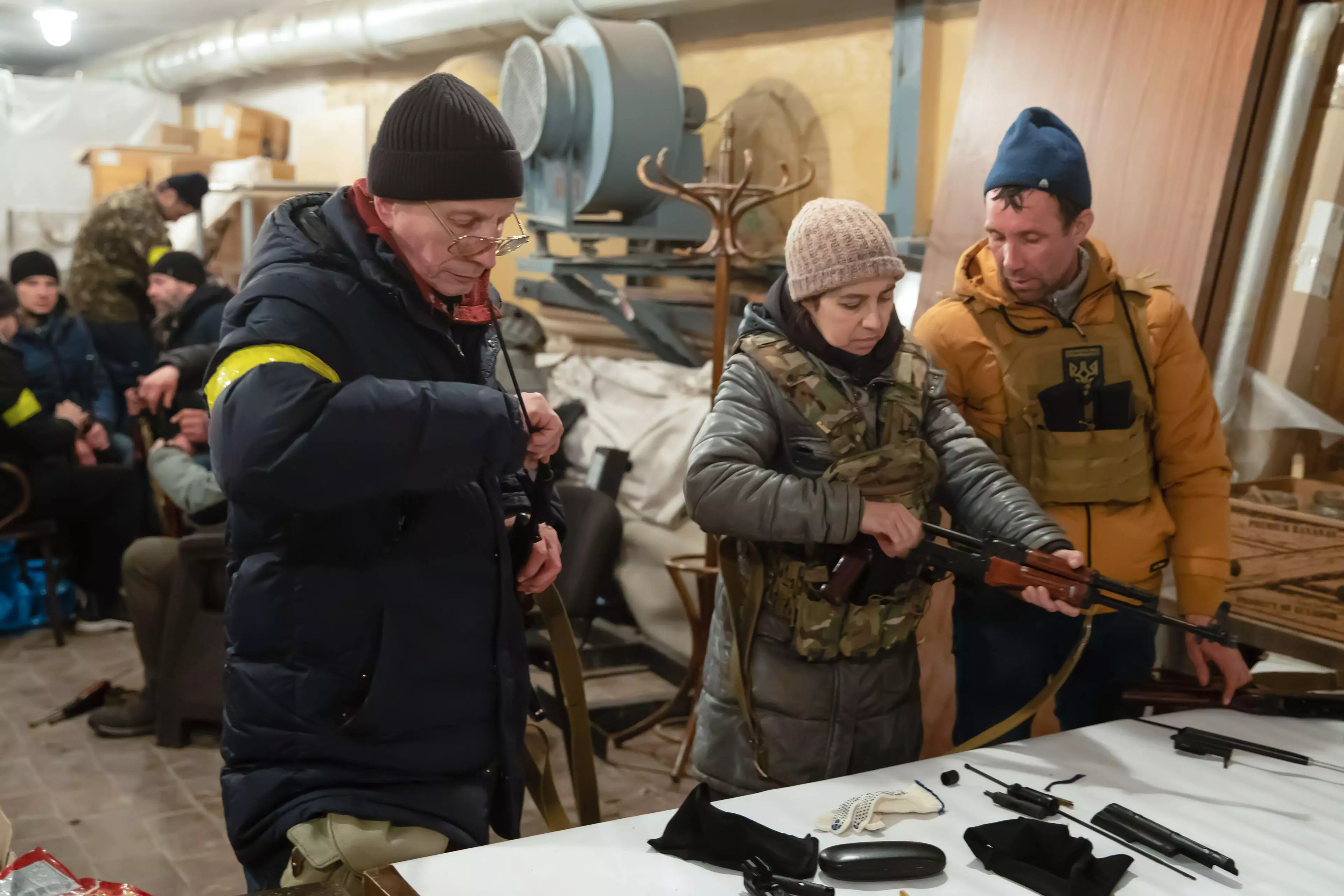Ukrainian civillians arm themselves against the Russian threat in Kyiv. 