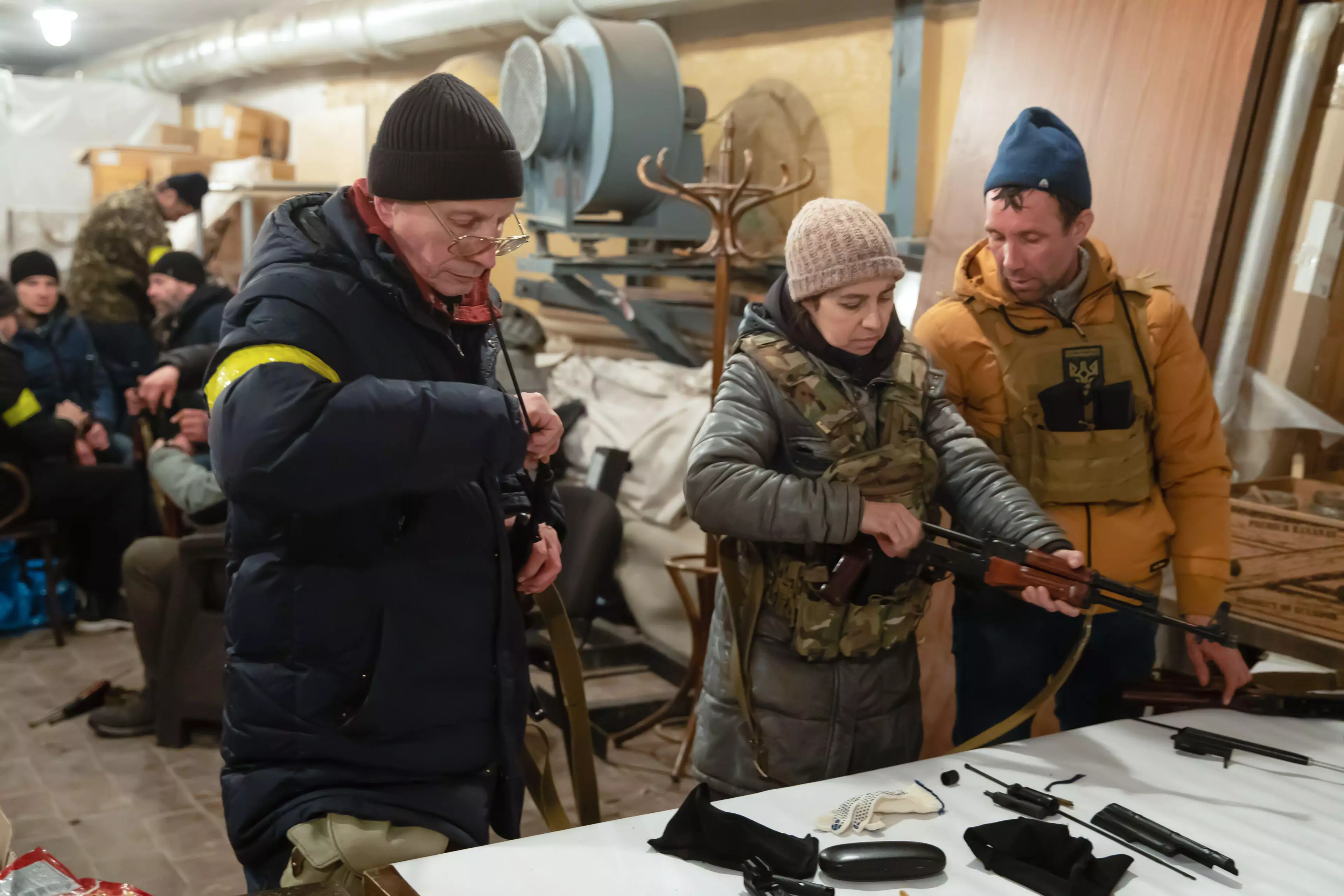 Ukrainian civillians arm themselves against the Russian threat in Kyiv.