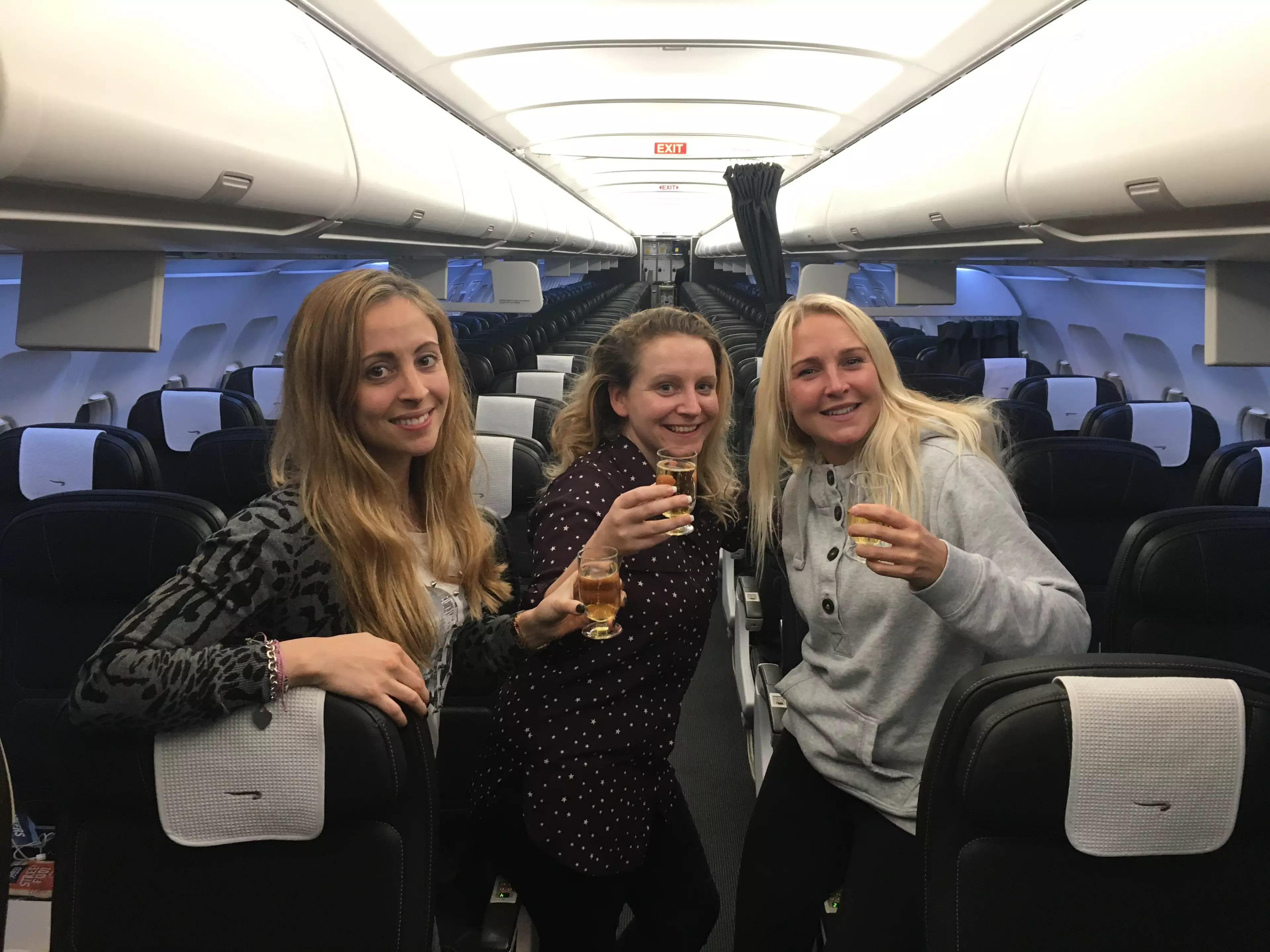 Three Women Get Upgraded To Business Class Because There's No One On Their Flight