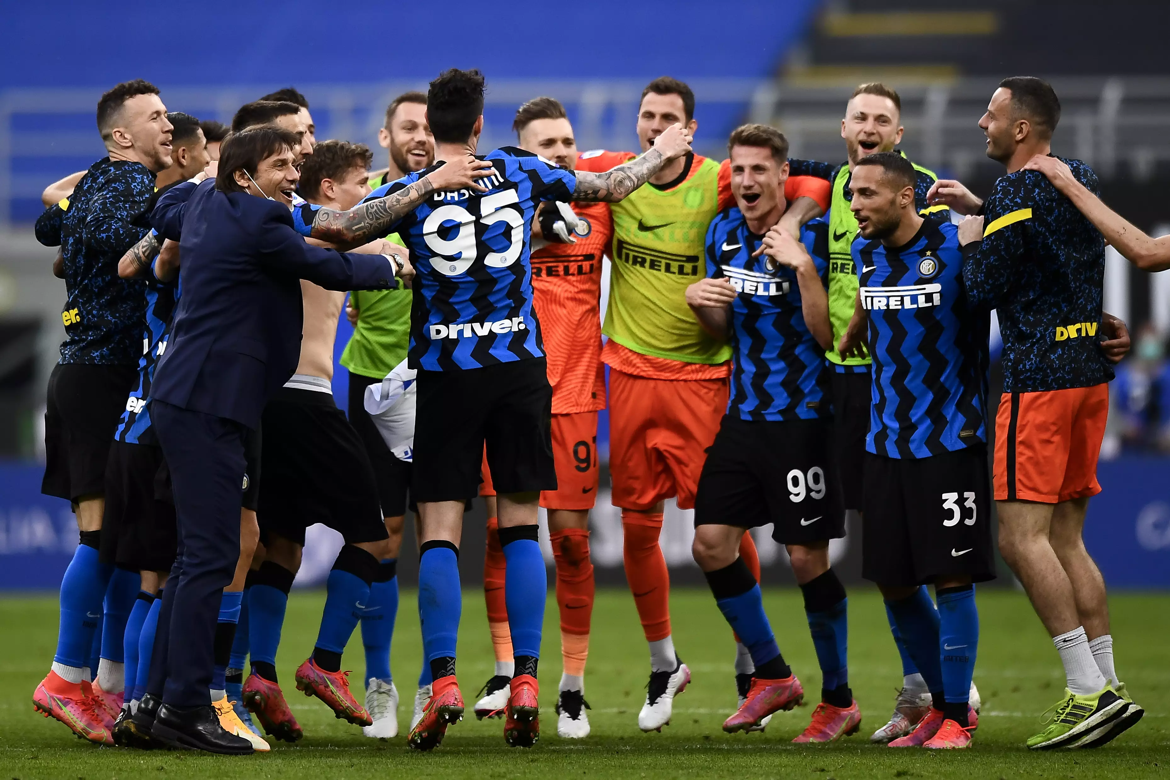 Conte celebrates with his players, having been crowned champions of Italy. Image: PA Images