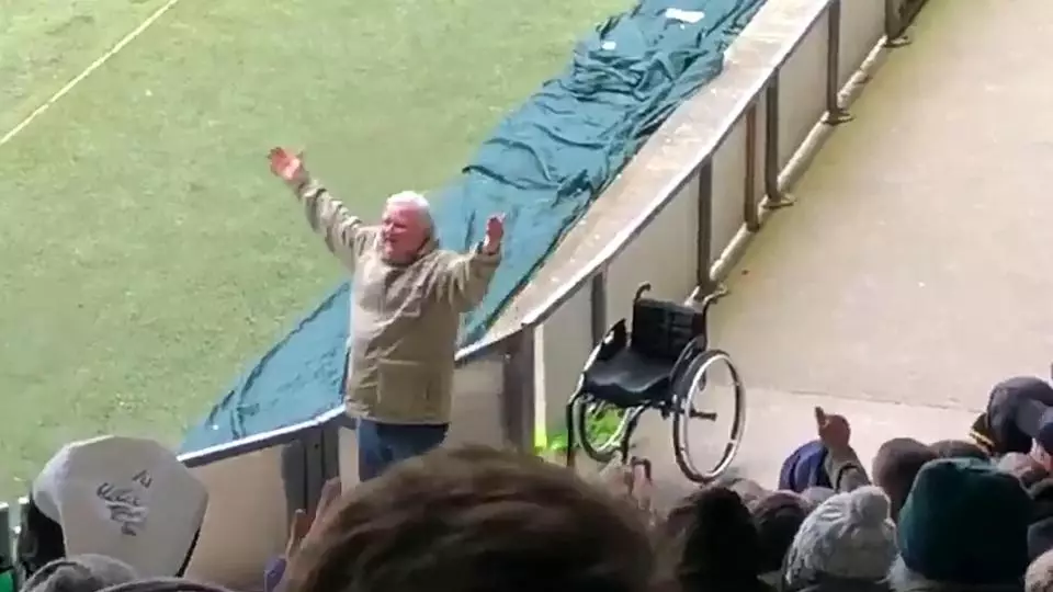Football Fan Jumps Out Of Wheelchair When Team Scores