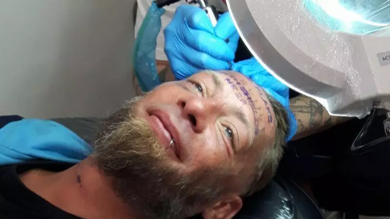 Homeless Man Paid To Get Groom's Name Tattooed On His Forehead