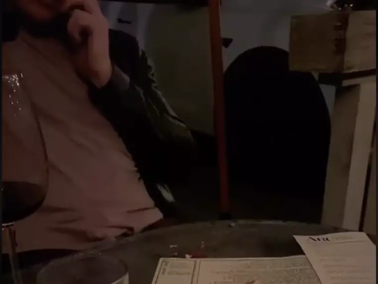 The TikToker exposed her date for taking two phone calls while sat at the table.