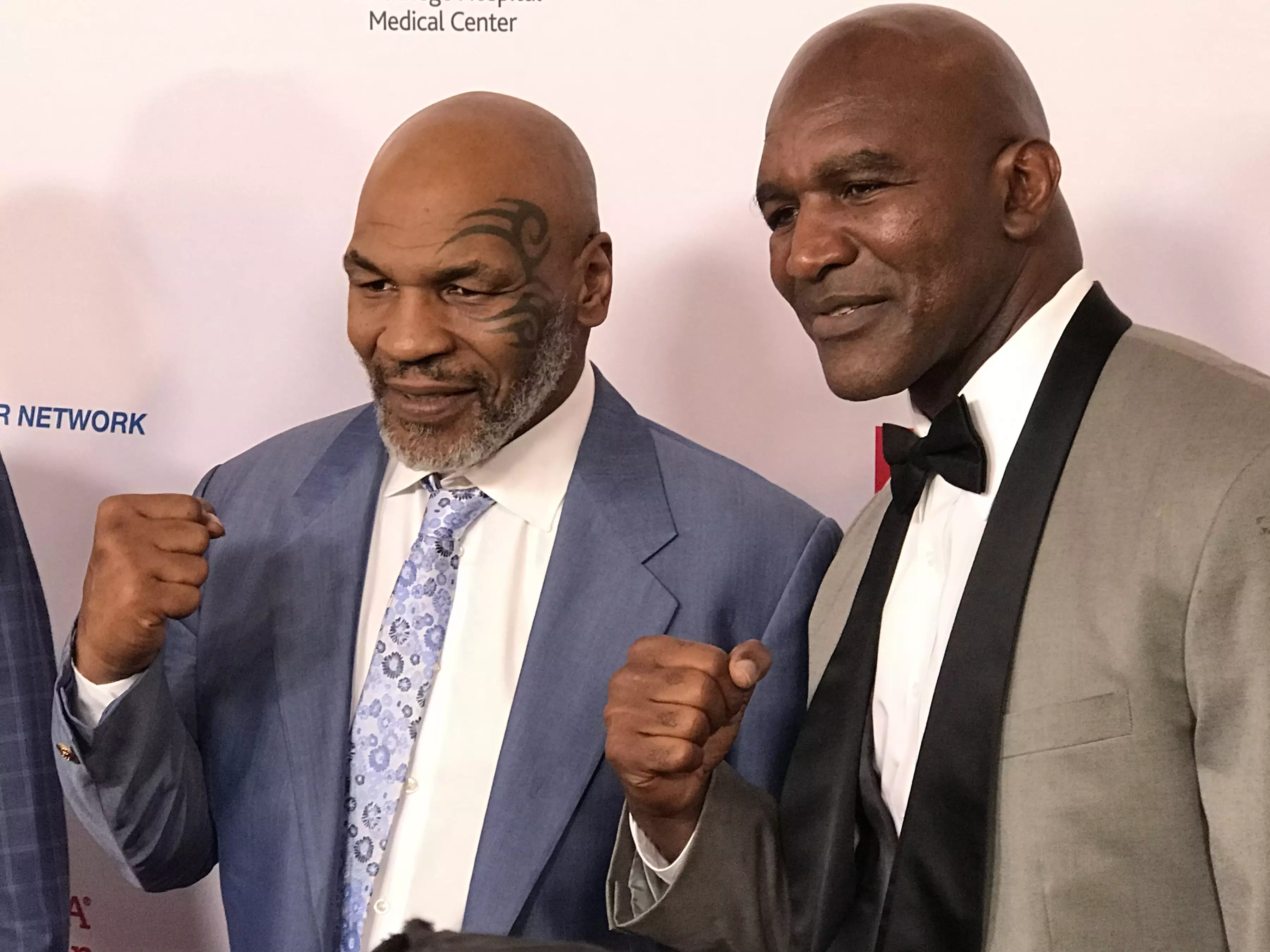 Holyfield with former rival Mike Tyson. Image: PA Images