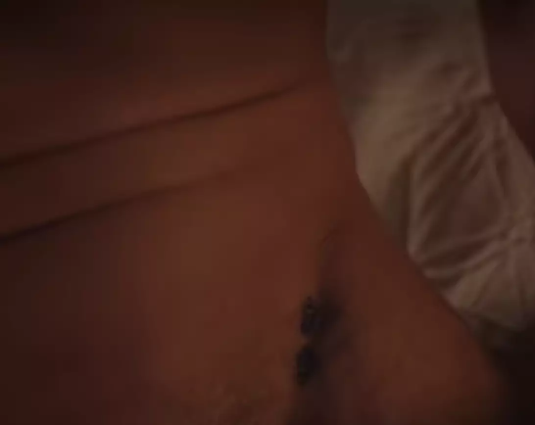 The bee tattoo is missing from the shower scene (