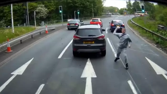 ​Angry Driver Lobs Pint Of Milk At Vehicle Following Behind