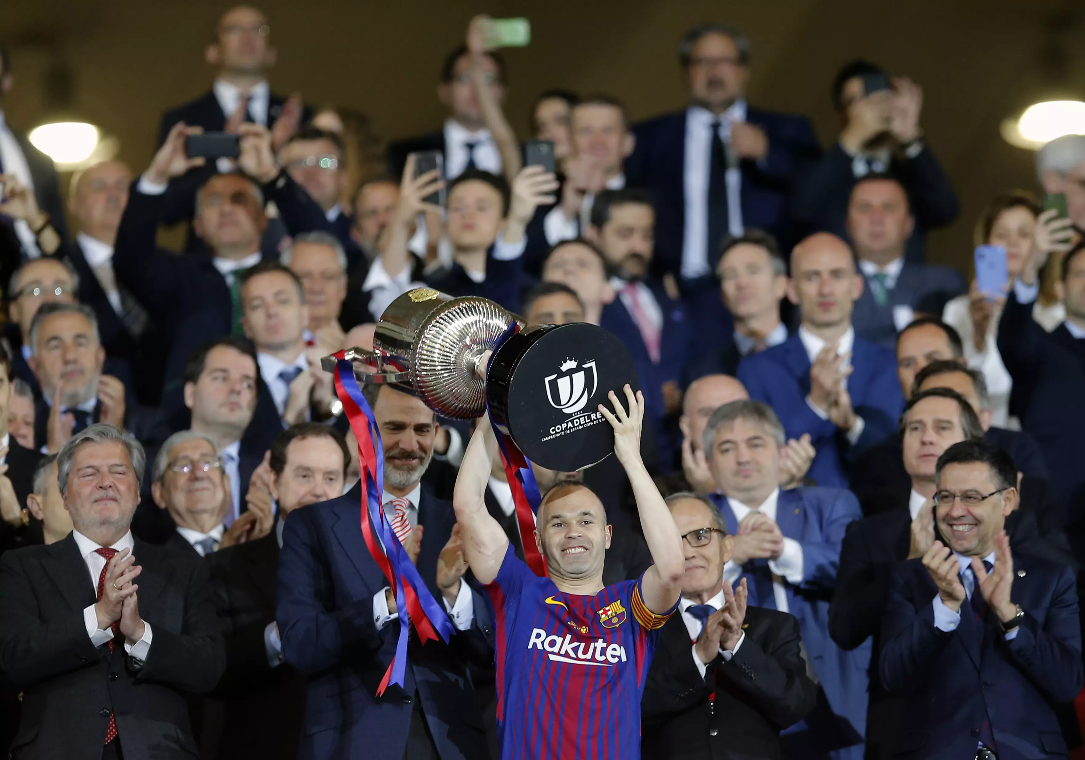 Iniesta holds aloft the Cope del Rey. Image: PA