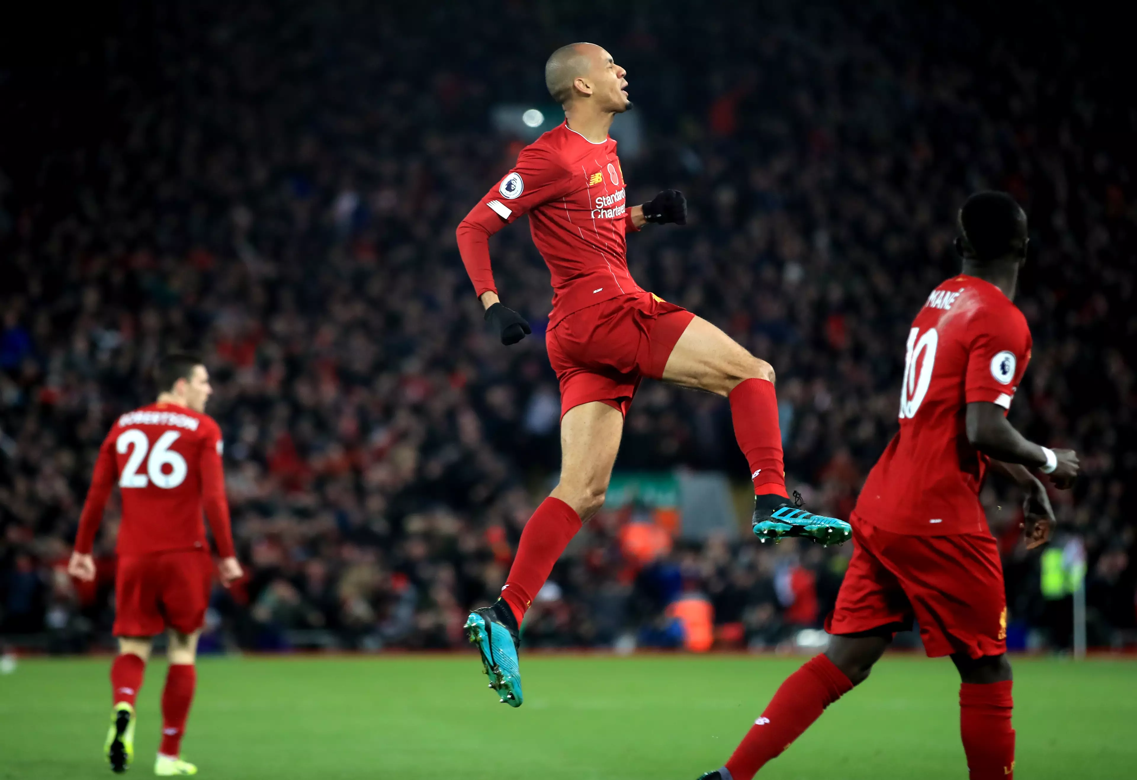 Fabinho celebrates putting Liverpool ahead, on their way to opening up a nine point gap. Image: PA Images