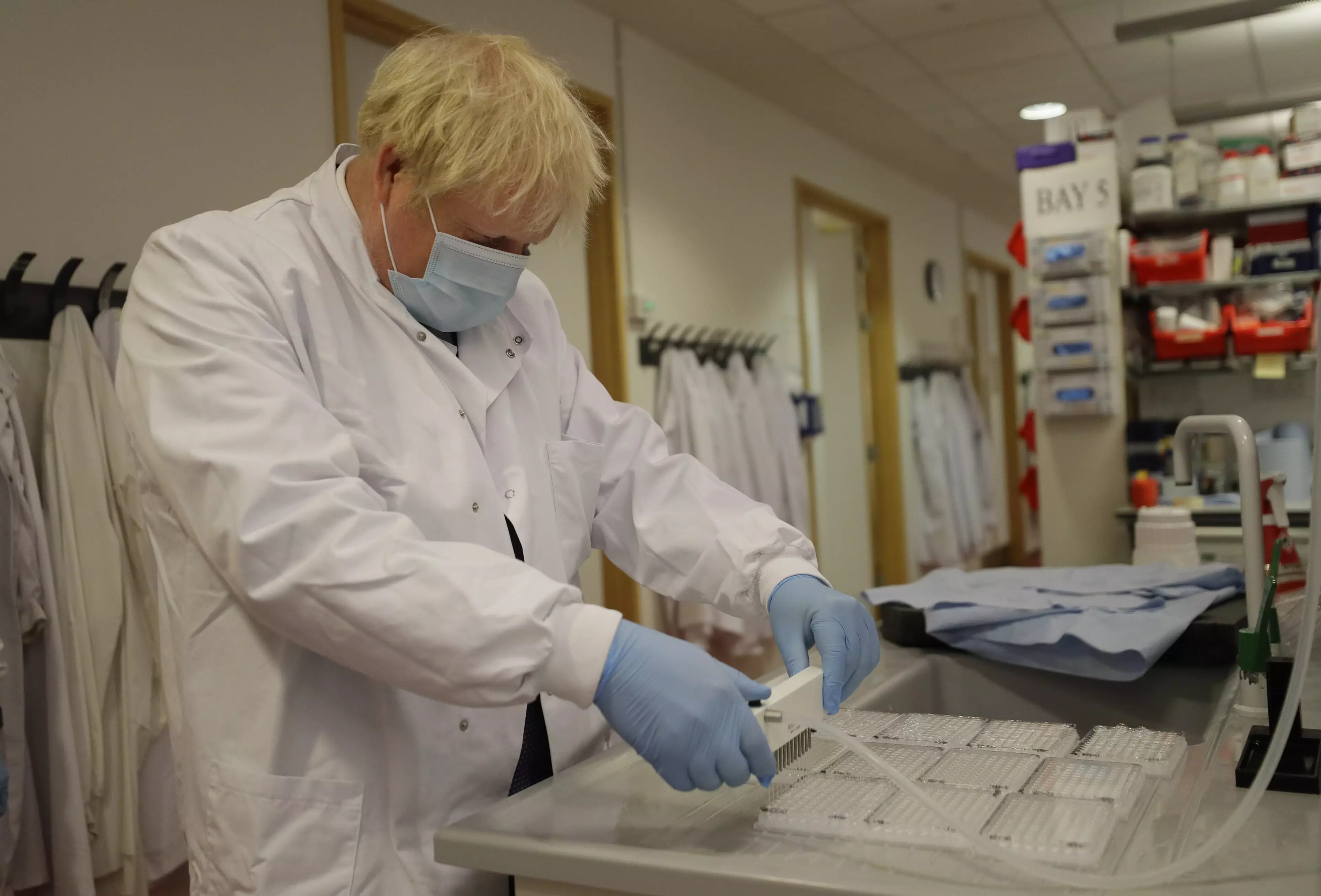 Boris Johnson visited scientists leading the research in September.