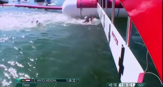 WATCH: 10Km Swimmer Disqualified After 'Dunking' Opponent At Finish Line