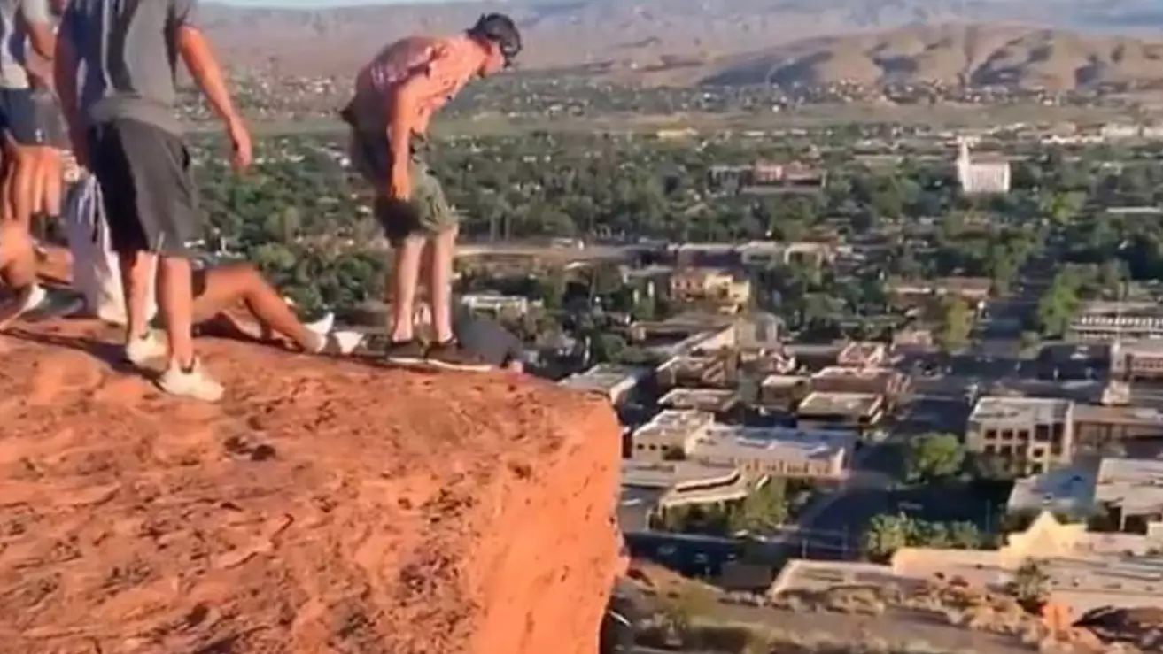 American Football Team Help Rescue Woman Hanging Off Cliff