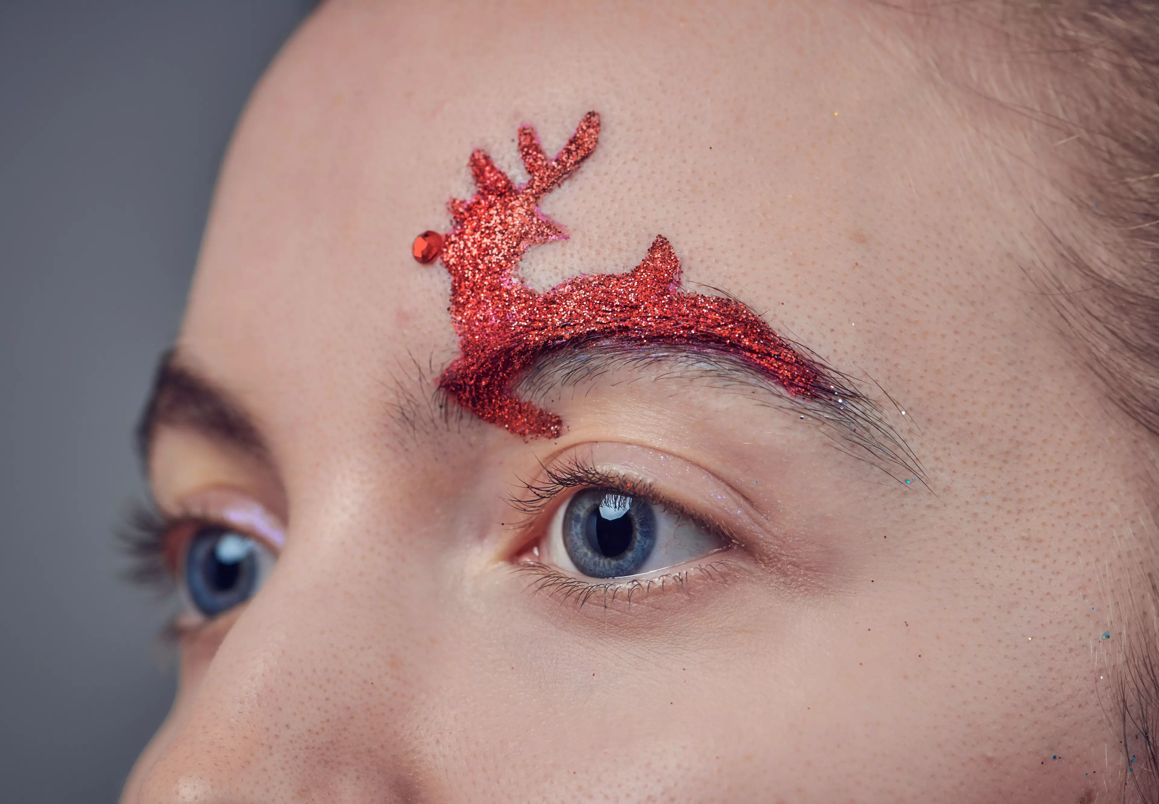Try decking out your brows with a leaping red Rudolph designs or iridescent bow of holly (